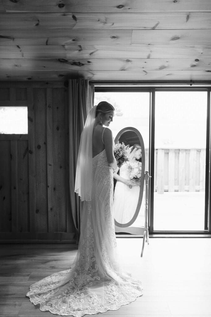 Elegant bridal portrait in front of a mirror