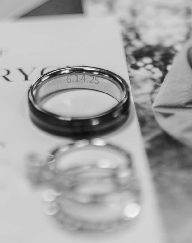 Groom's ring with the wedding date, 6/14/25, engraved