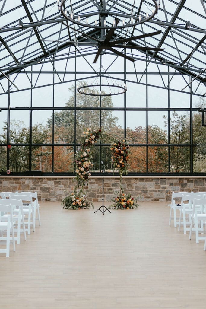 Greenhouse wedding ceremony at Westwynd Gardens