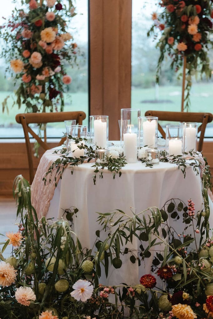 Whimsical and elegant candlelit sweetheart table