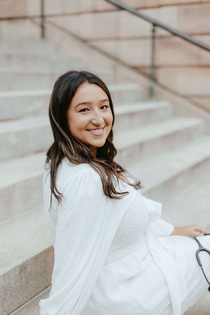 Nursing student college graduation portrait on the steps of Lancaster County Courthouse