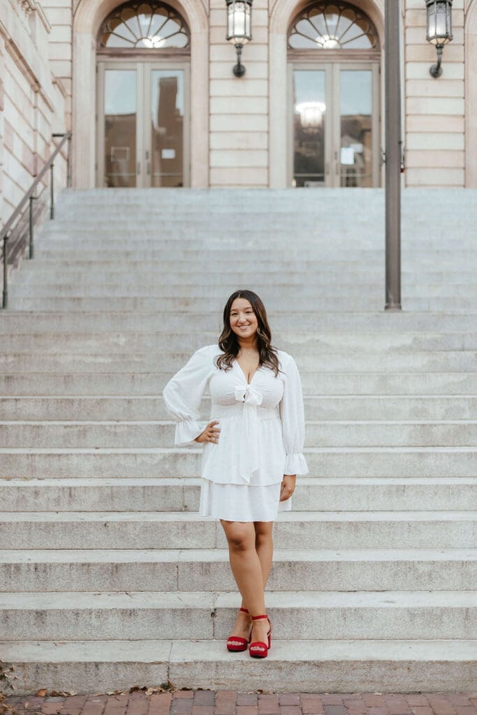 Nursing student college graduation portrait on the steps of Lancaster County Courthouse